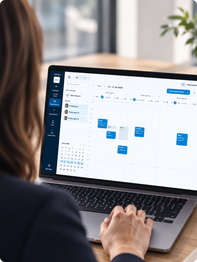 Woman with laptop looking at booking system